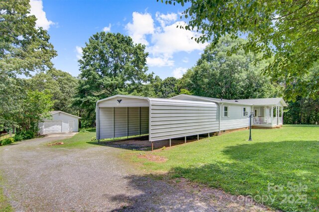 4648 Rifle Range Rd, Conover, NC 28613 - view of outbuilding featuring a carport, dirt driveway, and view of scattered trees
