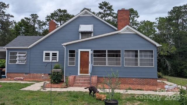 187 Cartledge Creek Rd, Rockingham, NC 28379 - bungalow-style home featuring entry steps, a chimney, and crawl space