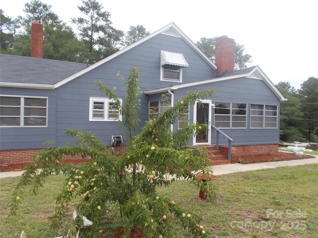 187 Cartledge Creek Rd, Rockingham, NC 28379 - view of front facade featuring a chimney and entry steps