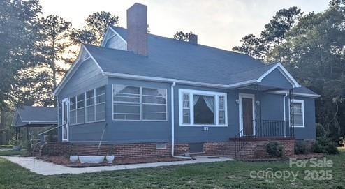 187 Cartledge Creek Rd, Rockingham, NC 28379 - view of front of home with a chimney and crawl space