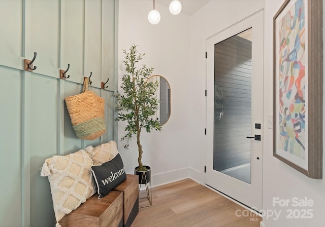 2004 St John St, Charlotte, NC 28216 - entrance foyer with light wood-style flooring and baseboards