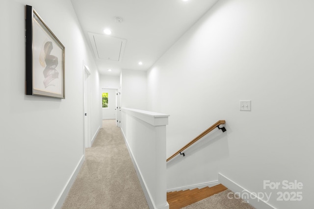2004 St John St, Charlotte, NC 28216 - hall featuring an upstairs landing, attic access, recessed lighting, and light carpet