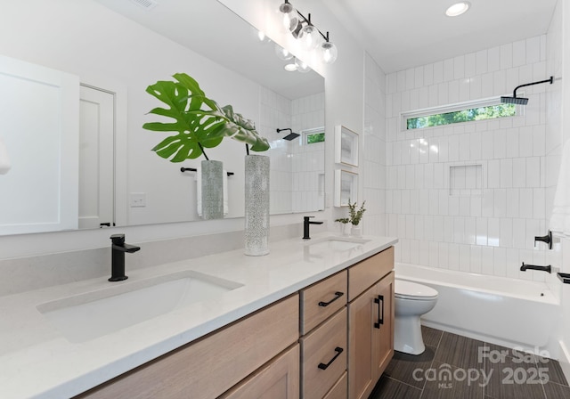 2004 St John St, Charlotte, NC 28216 - bathroom with double vanity and washtub / shower combination
