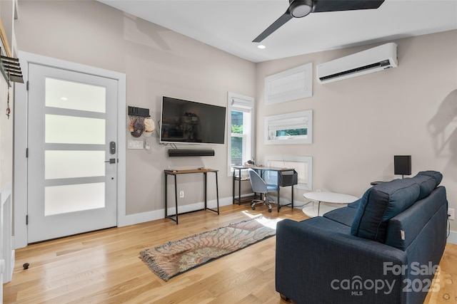 109 Thurland Ave, Asheville, NC 28803 - living area with a wall mounted AC, a ceiling fan, wood finished floors, and recessed lighting