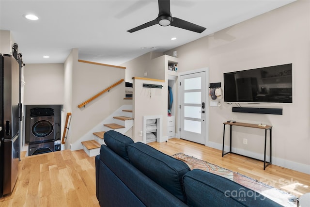 109 Thurland Ave, Asheville, NC 28803 - living room with stacked washer / drying machine, wood finished floors, a ceiling fan, stairs, and recessed lighting