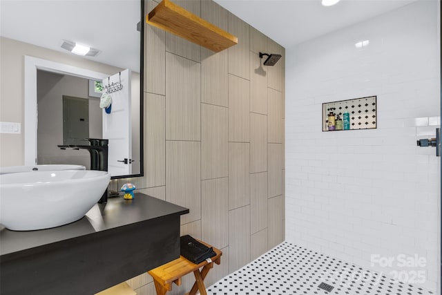 109 Thurland Ave, Asheville, NC 28803 - full bathroom featuring a tile shower, vanity, and electric panel