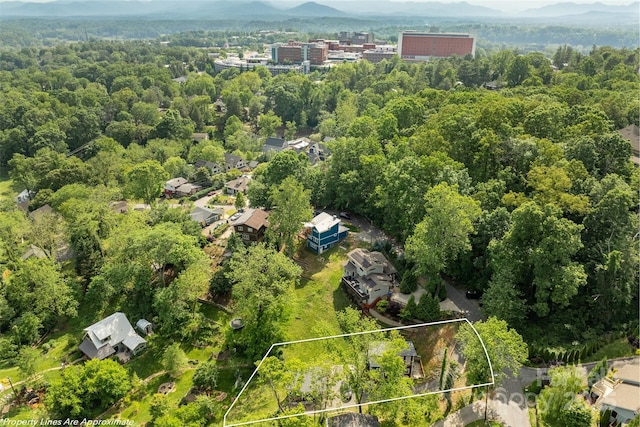 109 Thurland Ave, Asheville, NC 28803 - aerial overview of property's location with property parcel outlined and a mountainous background