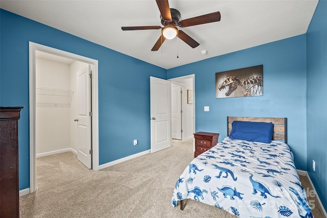 449 Misty Law Ln, Clover, SC 29710 - bedroom featuring carpet, a spacious closet, baseboards, a ceiling fan, and a closet