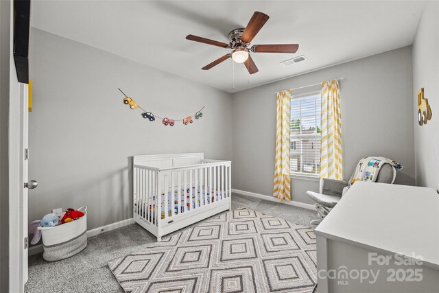 449 Misty Law Ln, Clover, SC 29710 - bedroom featuring a crib, carpet, baseboards, and a ceiling fan