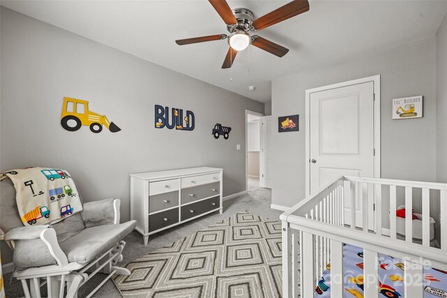 449 Misty Law Ln, Clover, SC 29710 - carpeted bedroom featuring baseboards, a crib, and ceiling fan