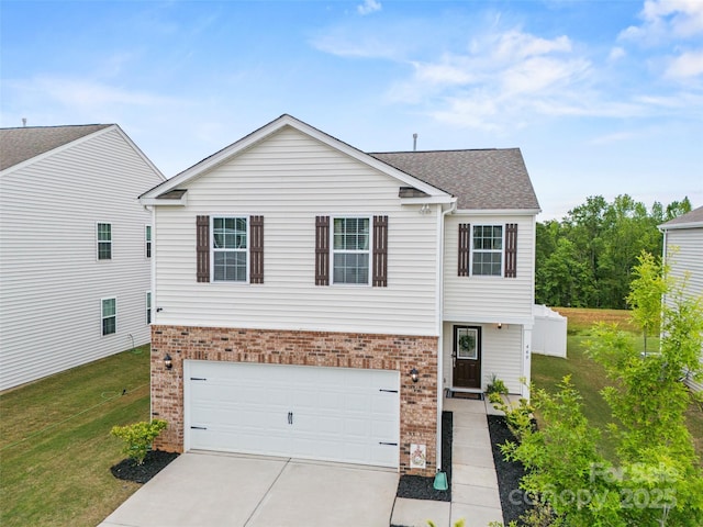449 Misty Law Ln, Clover, SC 29710 - view of front of house with brick siding, a front yard, driveway, and a garage
