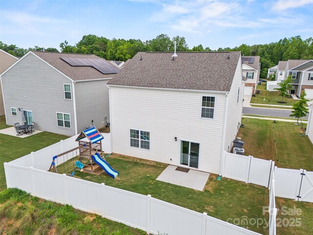 449 Misty Law Ln, Clover, SC 29710 - rear view of house with a patio, a playground, roof with shingles, and a gate