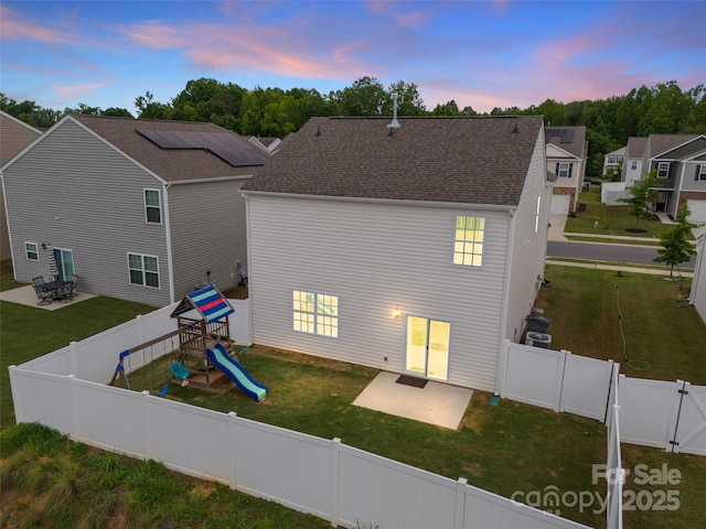 449 Misty Law Ln, Clover, SC 29710 - back of property with a patio area, a playground, a gate, and a shingled roof
