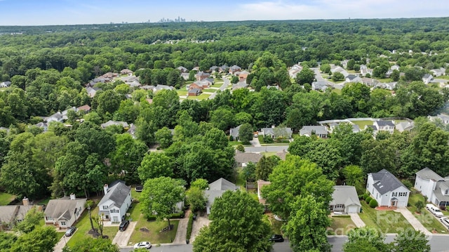 3801 Rosedown Dr, Matthews, NC 28105 - aerial view of property's location with nearby suburban area and a heavily wooded area