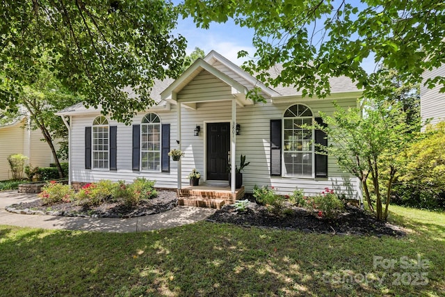 3801 Rosedown Dr, Matthews, NC 28105 - view of front of home featuring a front yard and roof with shingles