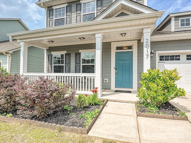 2017 New Hope Branch Way, Belmont, NC 28012 - doorway to property with a porch and an attached garage