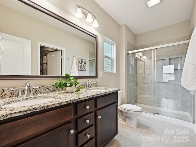 2017 New Hope Branch Way, Belmont, NC 28012 - full bathroom with double vanity, toilet, a shower stall, and tile patterned flooring
