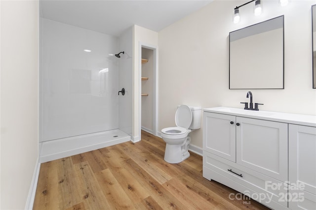 94 Camp Branch Rd, Black Mountain, NC 28711 - full bath with vanity, a shower, and wood finished floors