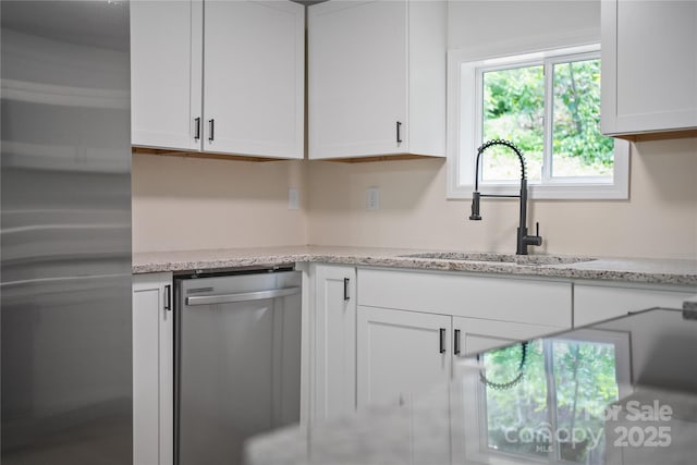 94 Camp Branch Rd, Black Mountain, NC 28711 - kitchen featuring appliances with stainless steel finishes, white cabinets, and light stone countertops