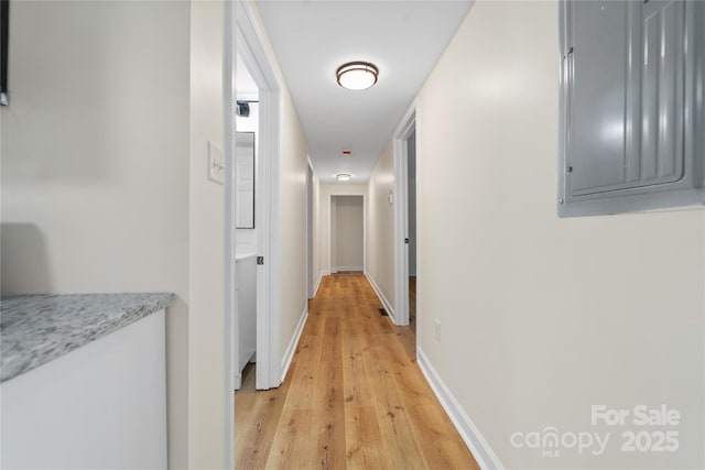 94 Camp Branch Rd, Black Mountain, NC 28711 - corridor featuring light wood-style floors and electric panel