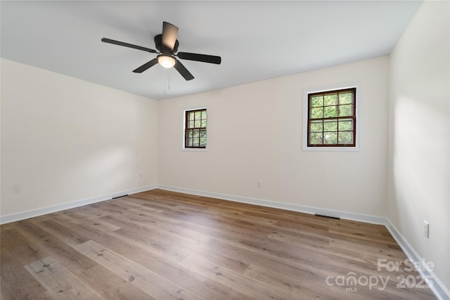 94 Camp Branch Rd, Black Mountain, NC 28711 - unfurnished room featuring wood finished floors and a ceiling fan