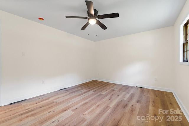 94 Camp Branch Rd, Black Mountain, NC 28711 - empty room with a ceiling fan and light wood finished floors