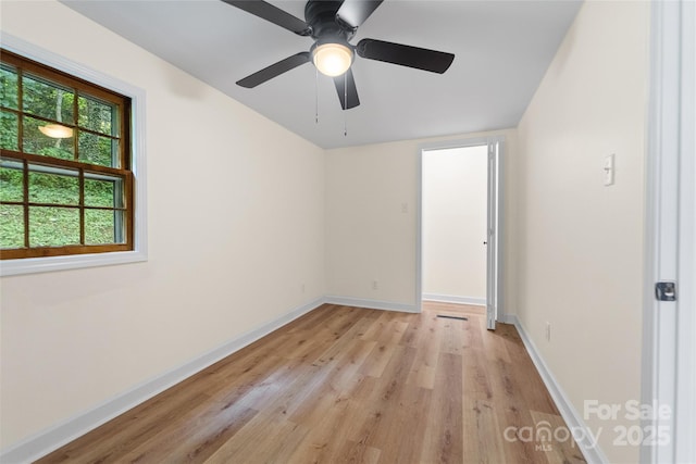 94 Camp Branch Rd, Black Mountain, NC 28711 - empty room featuring light wood finished floors and ceiling fan