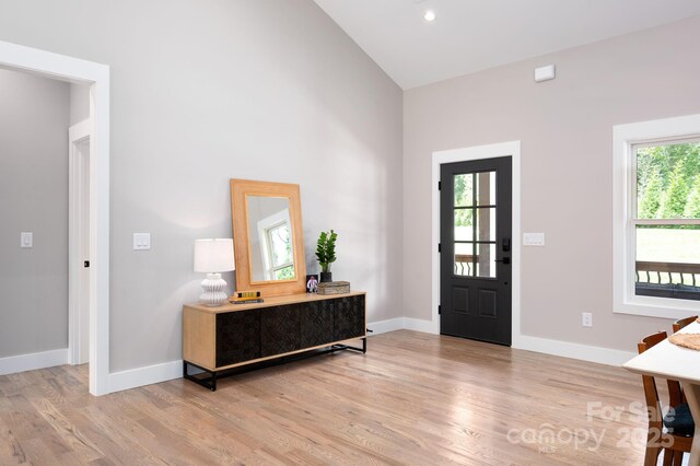 9 Robey Dr, Fletcher, NC 28732 - entryway with light wood finished floors and high vaulted ceiling