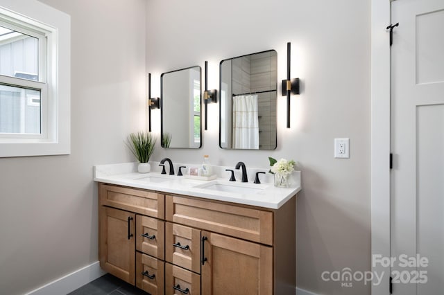 9 Robey Dr, Fletcher, NC 28732 - bathroom featuring double vanity and a shower with curtain