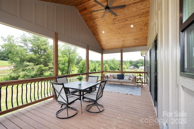 9 Robey Dr, Fletcher, NC 28732 - sunroom / solarium featuring an outdoor hangout area, ceiling fan, outdoor dining space, vaulted ceiling, and healthy amount of natural light