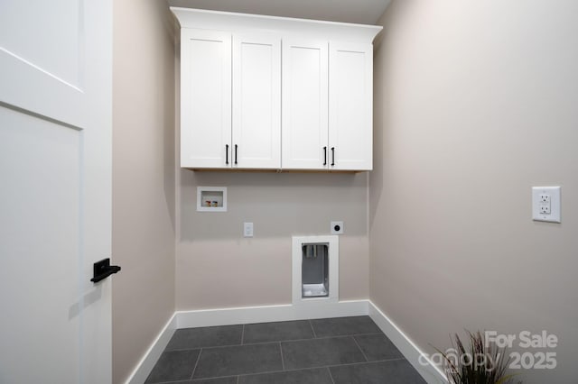 9 Robey Dr, Fletcher, NC 28732 - washroom with cabinet space, washer hookup, electric dryer hookup, and dark tile patterned flooring
