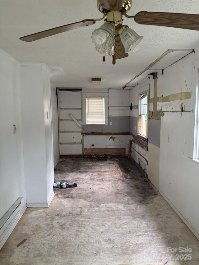 341 Talley St, Troutman, NC 28166 - kitchen with baseboard heating and a ceiling fan
