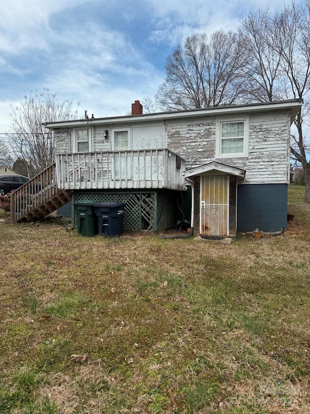 341 Talley St, Troutman, NC 28166 - back of house featuring a deck, a yard, a chimney, and stairs
