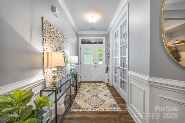 5088 Watersail Way, Clover, SC 29710 - entrance foyer with dark wood-style floors, ornamental molding, and french doors