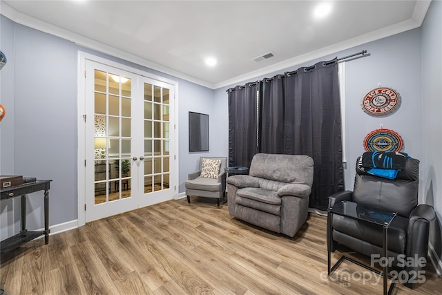5088 Watersail Way, Clover, SC 29710 - living area with french doors, ornamental molding, wood finished floors, baseboards, and recessed lighting