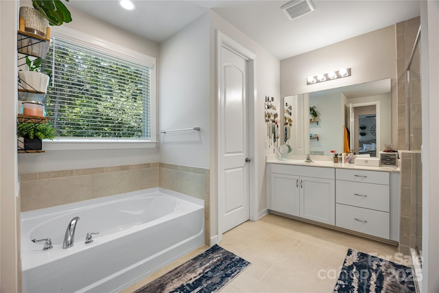5088 Watersail Way, Clover, SC 29710 - bathroom featuring vanity, a bath, and tile patterned floors