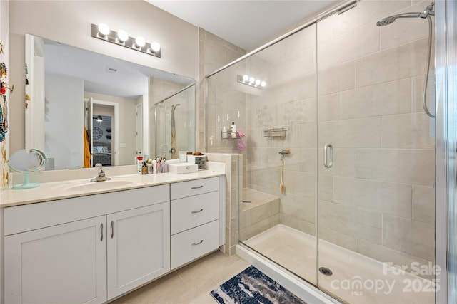 5088 Watersail Way, Clover, SC 29710 - ensuite bathroom with vanity, a stall shower, and tile patterned floors