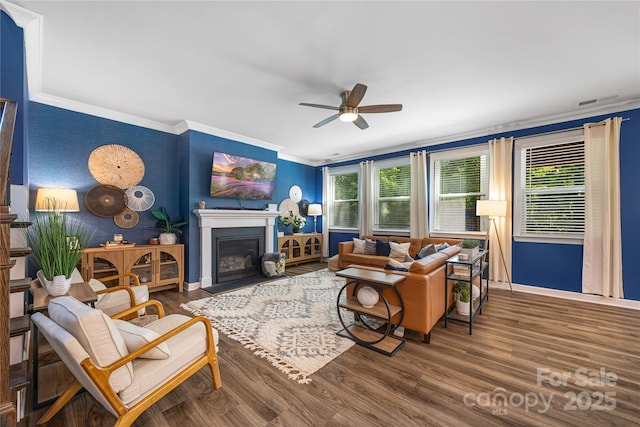 5088 Watersail Way, Clover, SC 29710 - living area with crown molding, wood finished floors, ceiling fan, baseboards, and a fireplace with flush hearth
