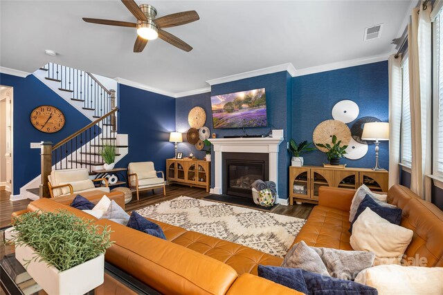 5088 Watersail Way, Clover, SC 29710 - living room with crown molding, stairs, ceiling fan, wood finished floors, and baseboards