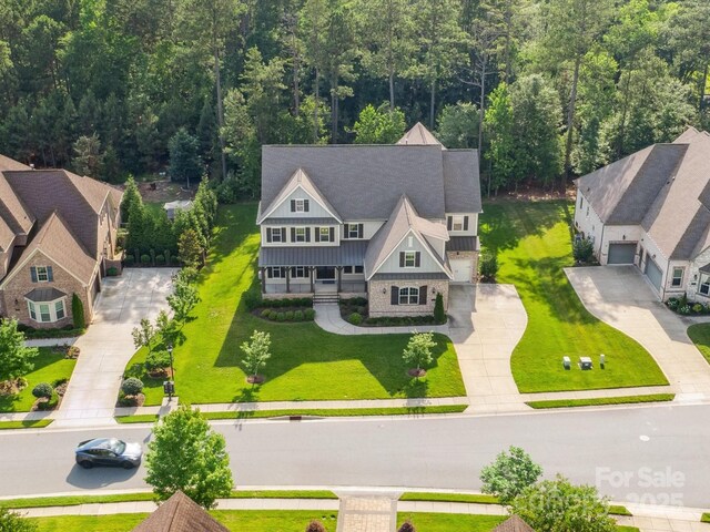 1008 Ladera Dr, Marvin, NC 28173 - view from above of property with a heavily wooded area