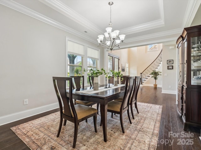 1008 Ladera Dr, Marvin, NC 28173 - dining room with a chandelier, plenty of natural light, dark wood-style floors, and ornamental molding