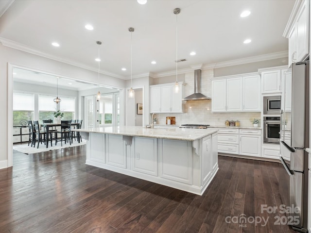 1008 Ladera Dr, Marvin, NC 28173 - kitchen featuring stainless steel appliances, wall chimney range hood, white cabinetry, light stone counters, and backsplash