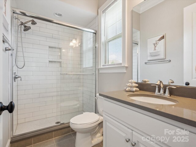 1008 Ladera Dr, Marvin, NC 28173 - bathroom with tile patterned floors, a stall shower, and vanity