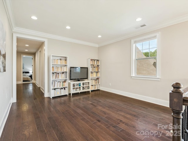 1008 Ladera Dr, Marvin, NC 28173 - living area featuring wood finished floors, ornamental molding, and recessed lighting