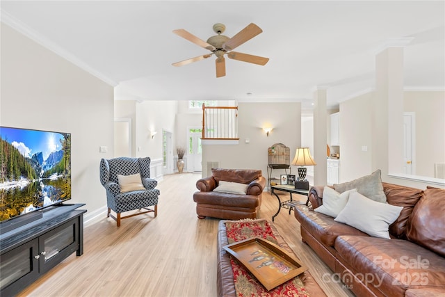 763 Evans Manor Dr, Weddington, NC 28104 - living area with light wood-style flooring, a ceiling fan, and ornamental molding