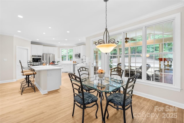 763 Evans Manor Dr, Weddington, NC 28104 - dining space with ornamental molding, light wood-style floors, recessed lighting, and baseboards