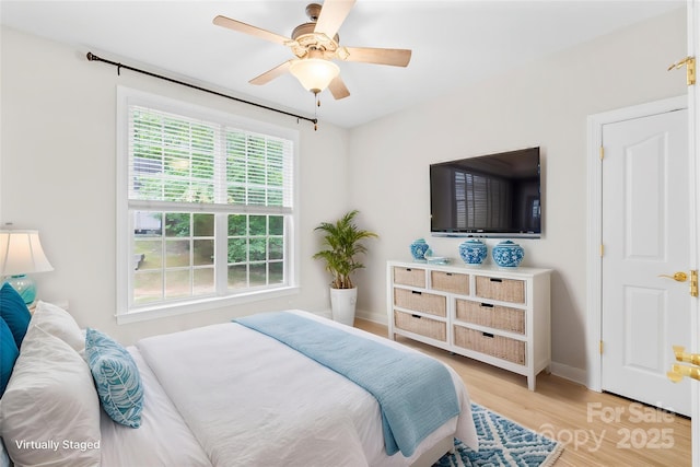 763 Evans Manor Dr, Weddington, NC 28104 - bedroom with wood finished floors, baseboards, and ceiling fan