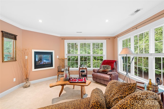 763 Evans Manor Dr, Weddington, NC 28104 - living area with baseboards, light carpet, a glass covered fireplace, ornamental molding, and recessed lighting