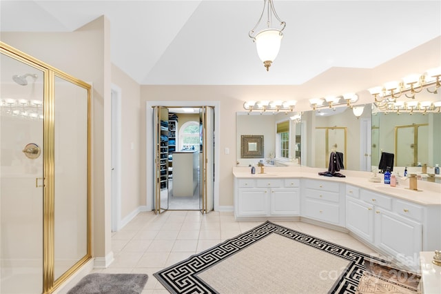 763 Evans Manor Dr, Weddington, NC 28104 - bathroom featuring a stall shower, tile patterned floors, double vanity, and lofted ceiling