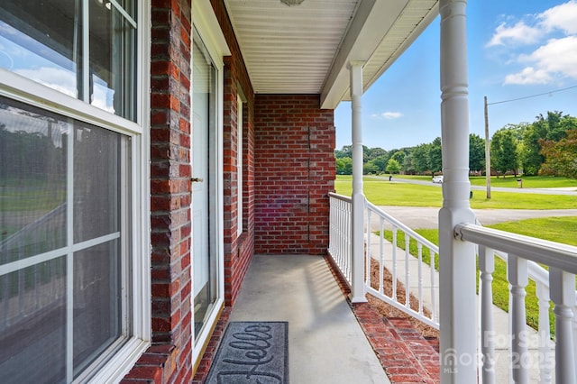 924 Secrest Hill Dr, Monroe, NC 28110 - porch featuring view of wooded area